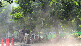 The CLTA Complex engulfed in thick smoke during the re-carpeting of roads.