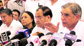 Union Minister of Parliamentary Affairs and Water Resources Pawan Bansal addresses a press conference in Dehradun on Monday.