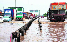 Traffic stuck due to waterlogging on the National Highway-8 in Gurgaon.
