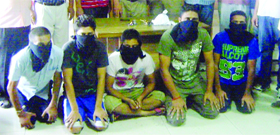 Five members of a looters gang in the police custody in Goraya on Monday.