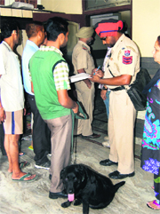 Police personnel investigate the burglary at a house in Qazi  Mandi in Jalandhar on Sunday.