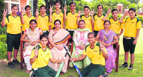 Members of the winning softball team of KMV Collegaite Senior Secondary School pose with their teachers in Jalandhar.