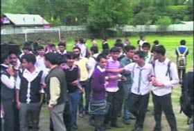 Students gather in the schools compound after boycotting their classes