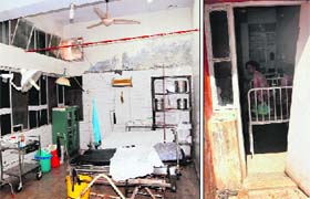 A dilapidated labour room and a room with a broken door