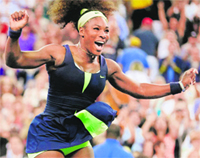 Serena Williams celebrates after her historic feat at Flushing Meadows on Monday.