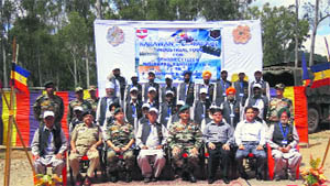 A group poses before the flaging off an industrial awareness tour in Nowshera. 