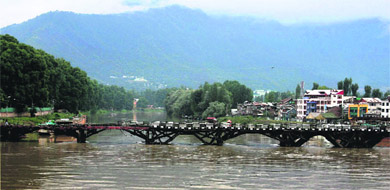 The Jhelum in spate following incessant rain in the Kashmir valley for over three days. Receding water levels on Tuesday prompted the authorities to suspend the flood alarm sounded on Monday. 