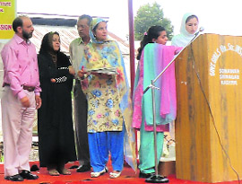 Participants speak at a symposium on  Save the Girl Child at Government Girls Higher Secondary School, Sonwar. 