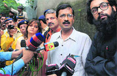 Arvind Kejriwal interacts with the media after meeting jailed cartoonist Aseem Trivedi at the Arthur Road Jail in Mumbai on Tuesday.