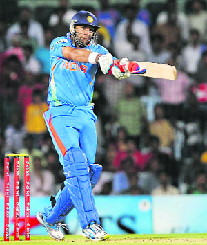 Yuvraj Singh plays a shot during the T-20 match between India and NZ in Chennai. Yuvi hit two towering sixes in his 34-run knock but India lost the match by 1 run. 