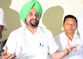 General secretary of the state BJP Manjeet Singh Rai addresses mediapersons in Amritsar on Wednesday