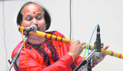 Pt Ronu Majumdar performs during a function held at the Post Graduate Government College for Girls in Sector 42, Chandigarh, on Wednesday. 