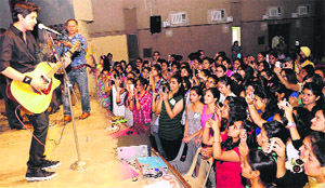 Students cheer a performance during Prakriti Utsav celebrations at the MCMDAV College in Sector 36, Chandigarh, on Wednesday. 