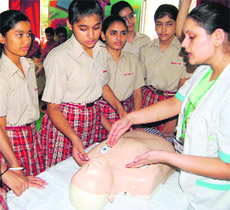 A doctor apprises students of first-aid methods at Shemrock Senior Secondary School in Sector 69, Mohali, on Wednesday. 