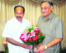 Chief Minister Vijay Bahuguna with Union Power Minister Veerappa Moily in New Delhi on Wednesday.