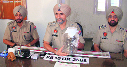 Fatehgarh Sahib SSP Hardial Singh Mann talks to mediapersons in Ludhiana on Wednesday. A Tribune photograph