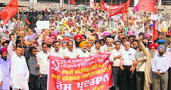 Activists of the CPI and the CPM hold a protest in Ludhiana on Wednesday. Photo: Inderjeet Verma