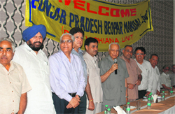Senior BJP leader Balramji Dass Tandon addresses an industrial conclave in Ludhiana on Wednesday. Photo: Inderjeet Verma