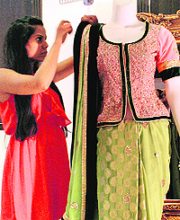 mini sondhi TAKES A LOOK AT THE FITTINGs OF HER GARMENTS 