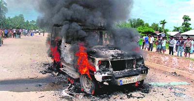 A vehicle of Assam minister Kharsing Engtis convoy was set on fire by an angry mob after a minor girl was killed after being hit by a vehicle of the convoy in Nagaon district of the state on Wednesday. 
