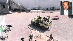 The African Union Mission in Somalia stand guard by two bodies at a Mogadishu hotel on Wednesday, and (inset) President Hassan Sheikh Mohamud