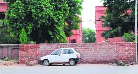 GOOD STEP: At the entrance to Sacred Heart Senior Secondary School from the main road, a wall has been raised by the school authorities in Amritsar