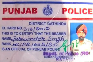 The identity card of the deceased cop.