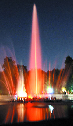 A brightly illuminated fountain at the Rose Garden that the mayors will visit.