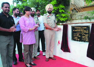 SSP Dr Sukhchain Singh Gill inaugurates newly-constructed basketball court on the premises of the Police Public School at the Police Lines in Bathinda on Thursday. Also seen in the picture is the principal of the school, Monika Singh. 