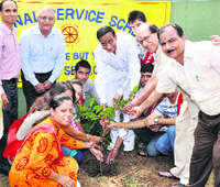 DAV College environment club members palnt saplings in the college, Chandigarh, on Thursday.