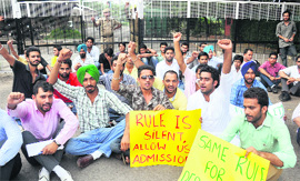 Students hold a protest in front of the VCs office in Chandigarh on Thursday. 