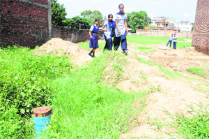 Incomplete work of rainwater harvesting system at Government Senior School, Karsan colony, in Chandigarh.