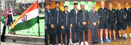 Flags of India and New Zealand hoisted at the CLTA courts in Chandigarh.  (right) Indian Davis Cup team and New Zealand players with UT Administrator Shivraj V Patil at the Punjab Governor House in Sector 6, Chandigarh, on Thursday.
