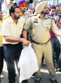 Cash and jewellery recovered from Fizas locker at Punjab National Bank, Sector 17, Chandigarh, on Thursday.