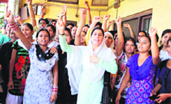 Students of the Institute of Music and Fine Arts protest in Jammu on Thursday.  A Tribune photograph