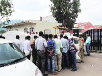 Vehicle owners  being challaned in Rajouri on Thursday. A Tribune photograh