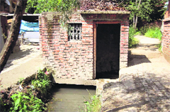 Illegally constructed structures on irrigation canals are commonplace across Anantnag and Kulgam districts. Photos by writer