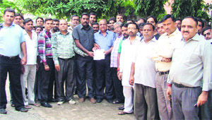 Members of the Tobacco, Cigarette and Beedi Wholesale Dealers Association submit a memorandum to the Civil Surgeon in Ludhiana on Thursday. 