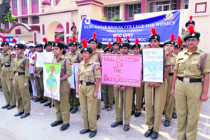 The NCC unit and the Youth Club of the Guru Nanak Khalsa College for Women take part in an environment rally. 