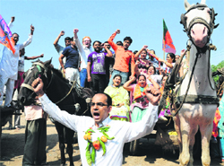 Members of the Bharatiya Janata Party take out a horse cart rally to protest against a hike in diesel and LPG rates at Maloya in Chandigarh on Friday. Tribune photo: parvesh chauhan