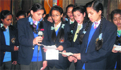 Students of St Clares School recite a poem of Chandra Kunwar Barthwal on his 67th death anniversary in Mussoorie on Friday.