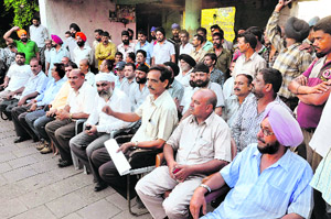Private transporters address mediapersons in Jammu on Friday