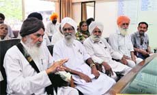 Freedom fighters at the DCs office in Ludhiana on Friday.