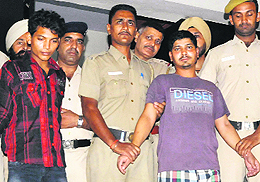 The accused in police custody.