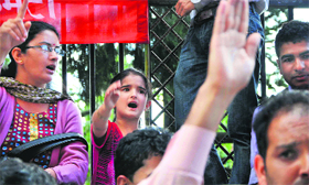 CPM activists raise slogans against Foreign Direct Investment in retail in Shimla on Saturday.