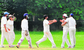 Players in action during the second day of the match between Mohali and Ludhiana held at the PAU on Saturday. 