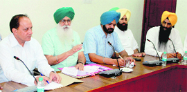Mandi Board chairman Ajmer Singh Lakhowal addresses media persons in Ludhiana on Saturday. 