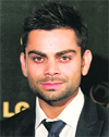 Indias Virat Kohli poses with the ICC One-day Cricketer of the Year trophy at the ICC Awards in Colombo on Saturday.  Reuters