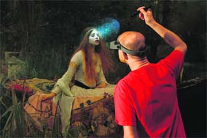 Tate Gallery frame conservation technician Adrian Moore inspects The Lady of Shalott at the Museum and Art Gallery in Birmingham, central England