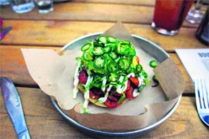 Spicy squid tostadas at Mexican restaurant Grand Electric in Toronto